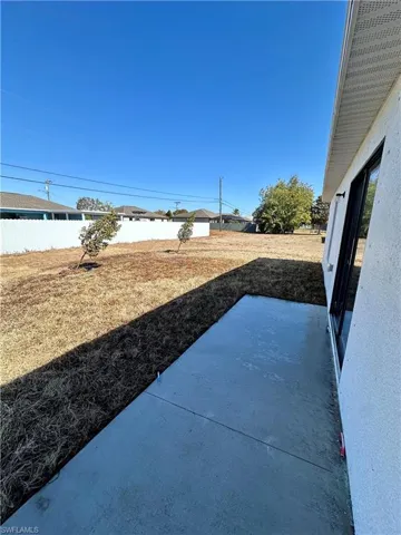 Fenced yard featuring a patio area