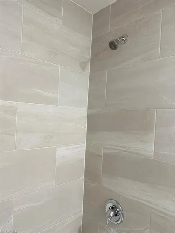 Bathroom view of tiled shower