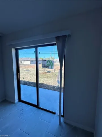 Entryway featuring baseboards