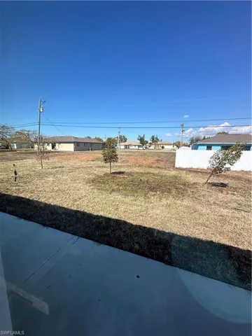 View of yard featuring a residential view