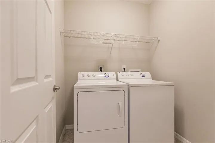 Laundry area with separate washer and dryer