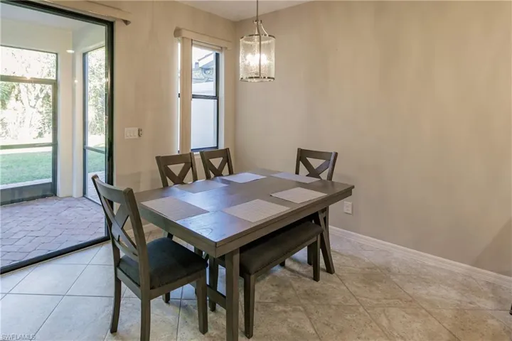 Dining area featuring an inviting chandelier