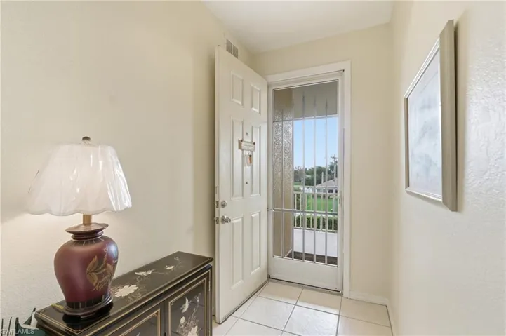 Screened in front door allows for a refreshing cross breeze.