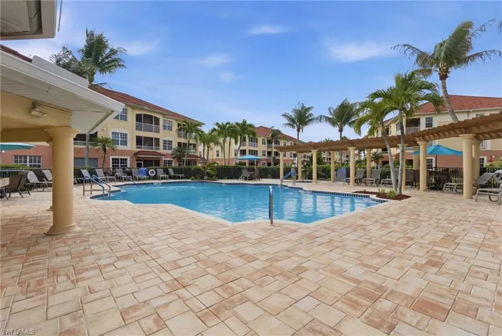 Pool area has lots of space for relaxing and sitting poolside.