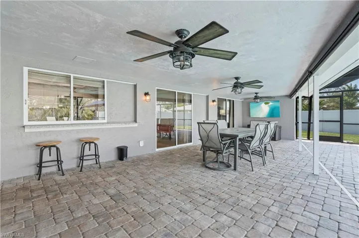 View of patio featuring large covered area
