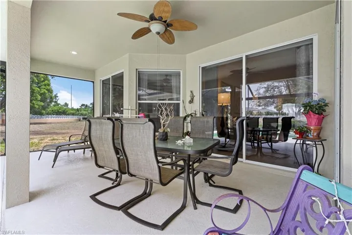 View of terrace featuring ceiling fan