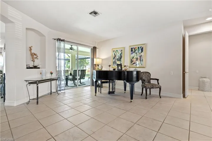 Miscellaneous room with light tile flooring