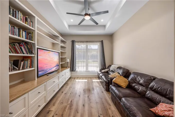 Den off of Great Room with French Doors.