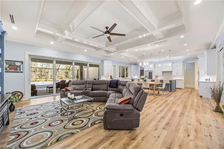 Great room with family area, formal dining and open kitchen.
