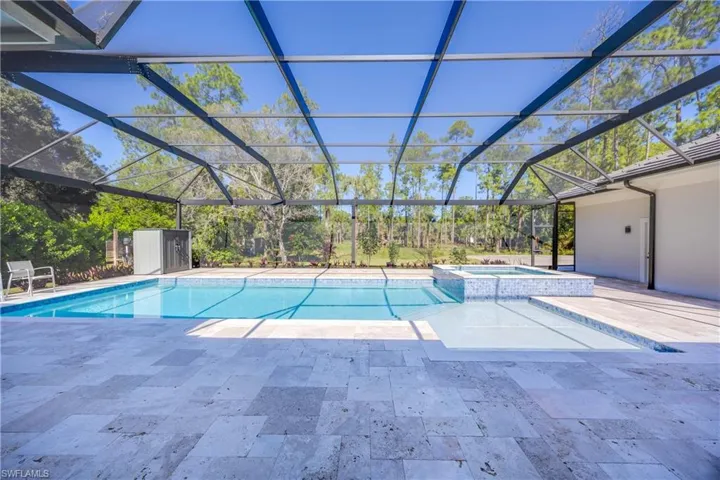 Saltwater pool and large hot tub.