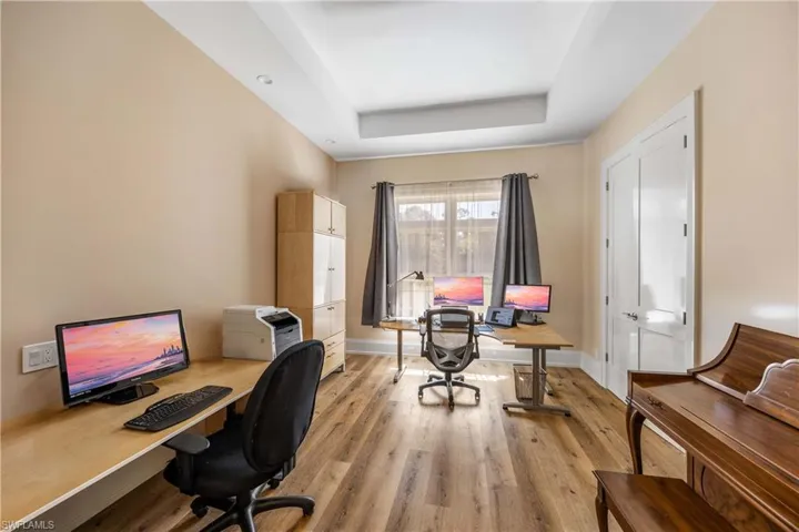 Spacious office with French doors.