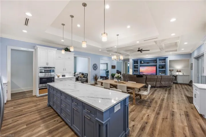 Kitchen features wall oven and microwave/convection oven combo.