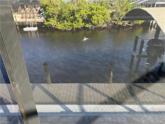 Manatee Bay is filled with daily visitors - this was taken from the lanai by the homeowner - there are normally multiple sightings of dolphins playing and chasing in the canal!