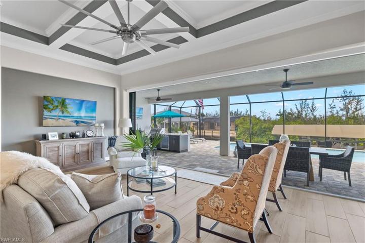 WOWZA!!!  9 foot tall impact pocket sliders that compleley disappear from view when opened.  This extends the living area and blends the outdoors and indoors for an expansive space, perfect to throw large gatherings or just to relax and enjoy our fall weather.