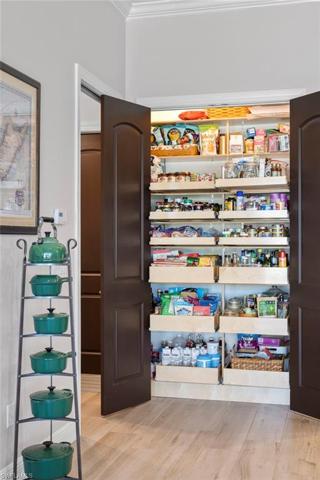Kitchen pantry with pull out cabinet drawers from Shelf Genie - you would not believe how much space there is!