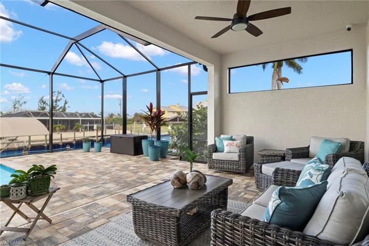 Extra large covered lanai with room for multiple seating/outdoor dining!  The very best living in SWFL is the one outdoors -  and this is the perfect setting to live your best life!