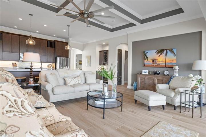 A large  great room with all kinds of beautiful upgrades and features. Owners were meticulous in their design choices - neutral two tone paint, very upgraded ceramic plank style flooring throughout, recessed art walls and upgraded lighting and fans...just to mention a few!  12 foot ceiings with beautiful detail add to the elegance of this gorgeous home!