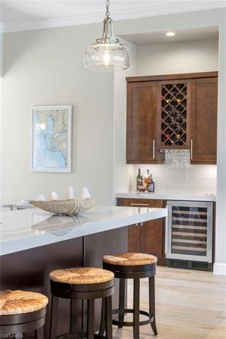 Additional bar and wine fridge for all of your entertaining needs!