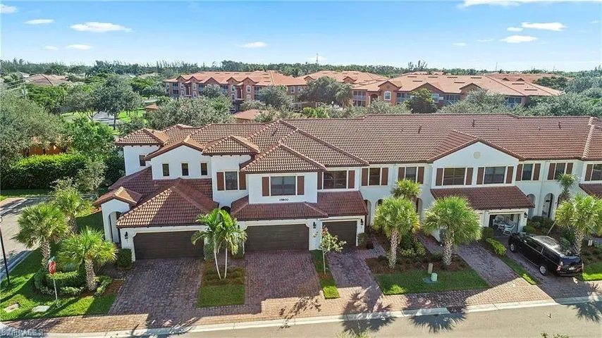 Mediterranean / spanish home featuring a two-car garage with amble storage!