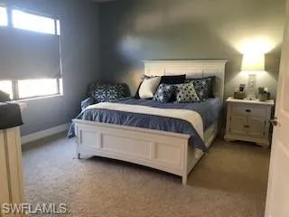 Master bedroom with to-down shades, oversized master closet and dual sink Master bathroom