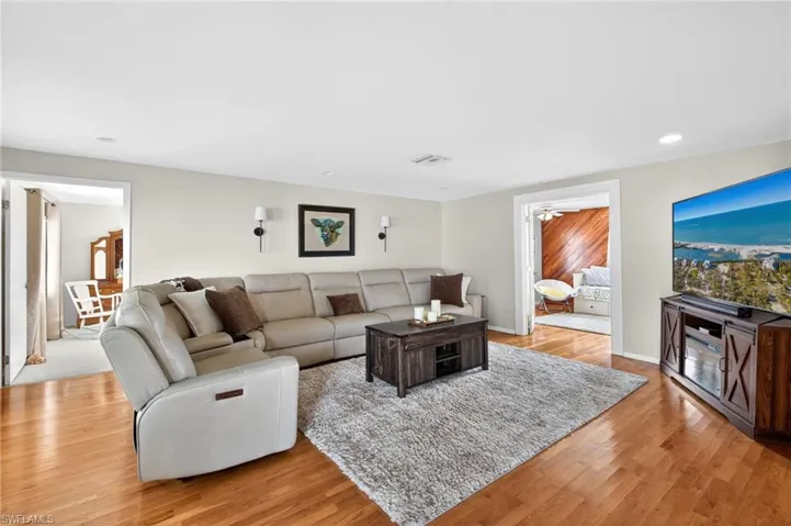 Living room with light wood-style floors