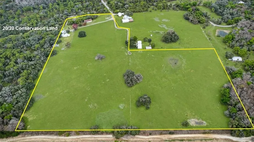 View of property's community featuring an outbuilding and a rural view