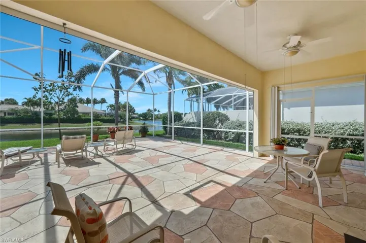 Sunroom featuring ceiling fan
