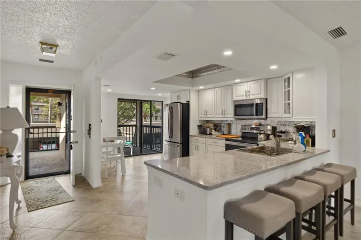 Spacious open and bright. Newer granite and open to living area