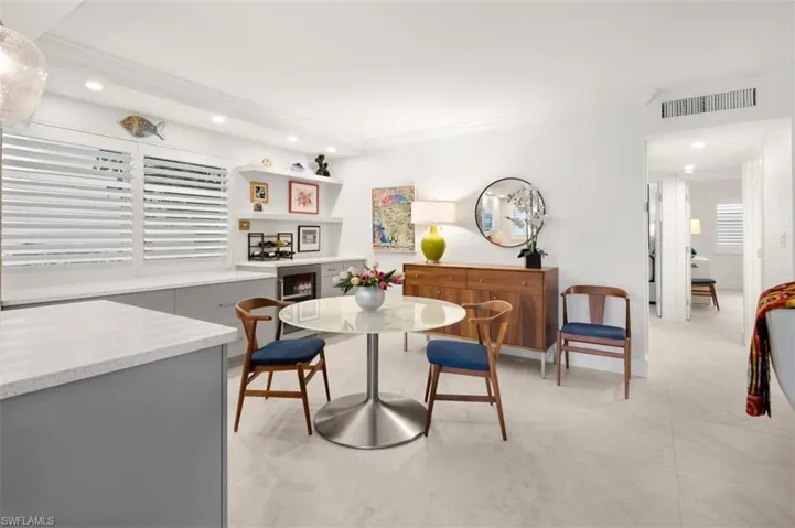 Dining space with breakfast area and recessed lighting