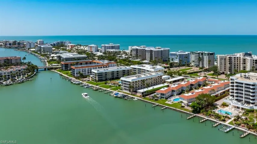 View of urban area featuring a nearby body of water