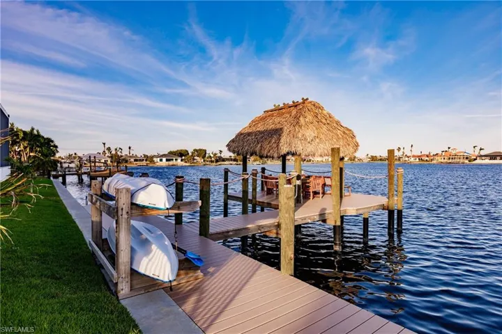 Dock area featuring a water view and a gazebo