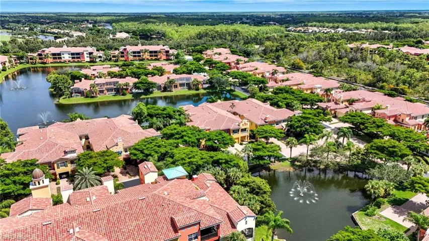 Aerial view of residential area with a nearby body of water