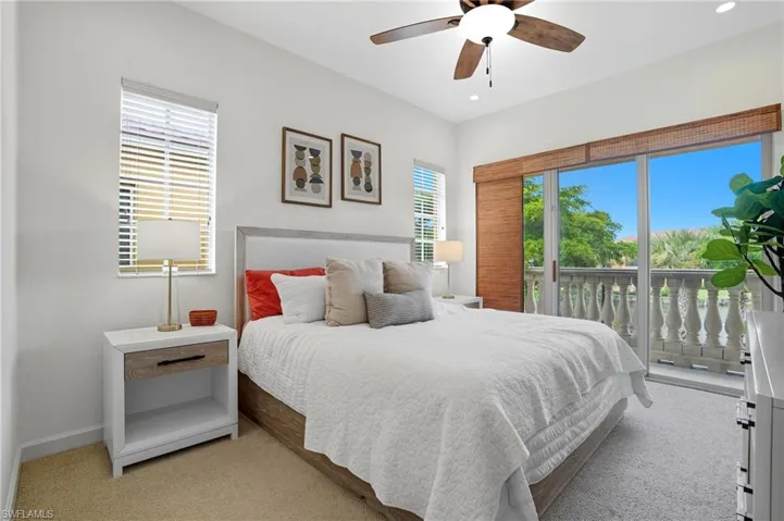 Bedroom with carpet, access to exterior, ceiling fan, and recessed lighting