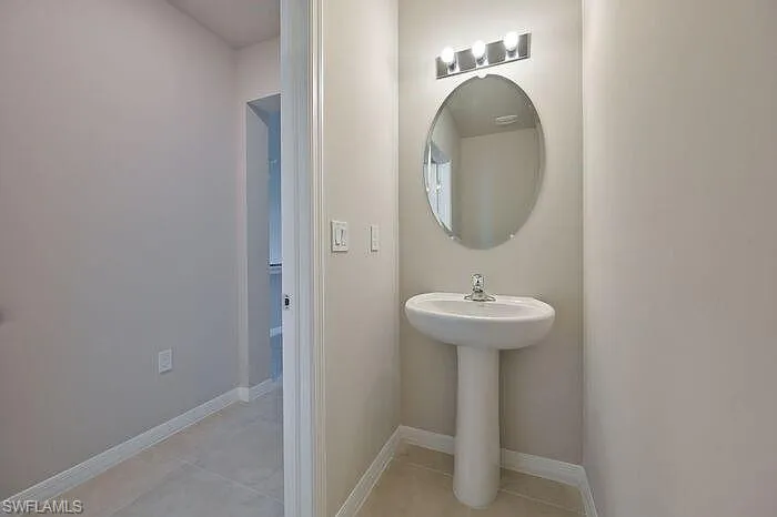 Bathroom featuring light tile patterned floors