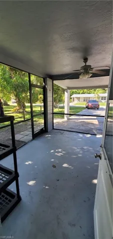 View of patio with ceiling fan