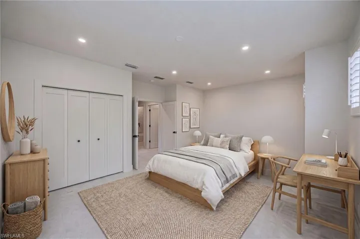 Large virtually staged third bedroom highlighting the generous size and possibilities for guests, a home office or private retreat