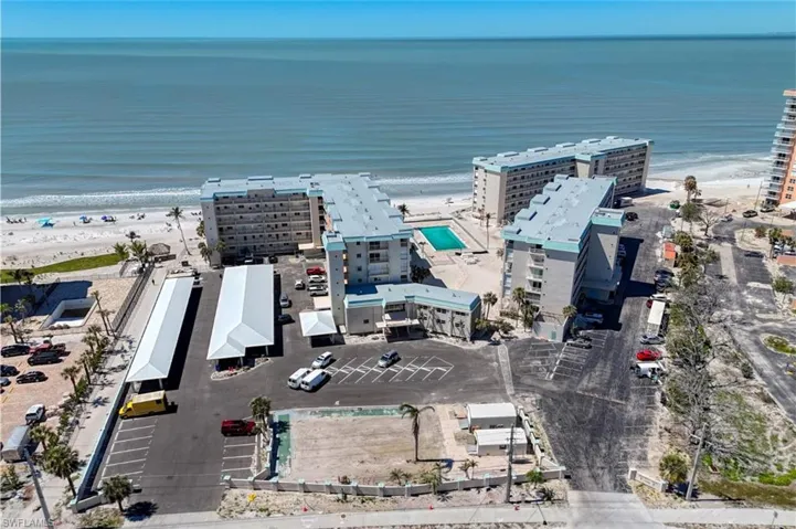Aerial view with a beach view and a water view