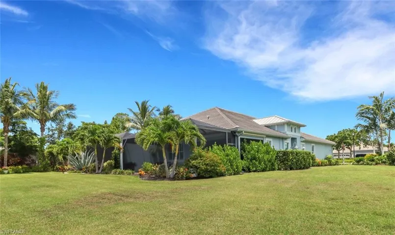View of home's exterior with a lawn