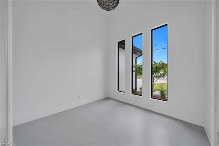 Spare room with baseboards