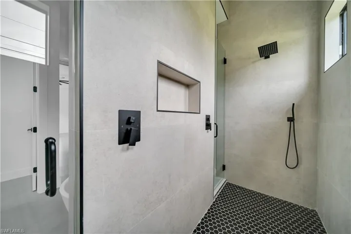 Bathroom with a shower stall