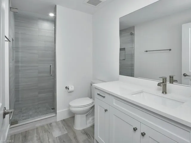 Guest Bathroom with single vanity and walk-in shower