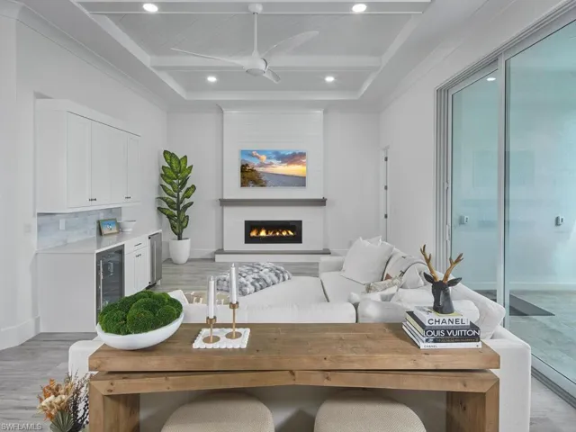 Living area featuring a dry bar & under counter beverage cooler