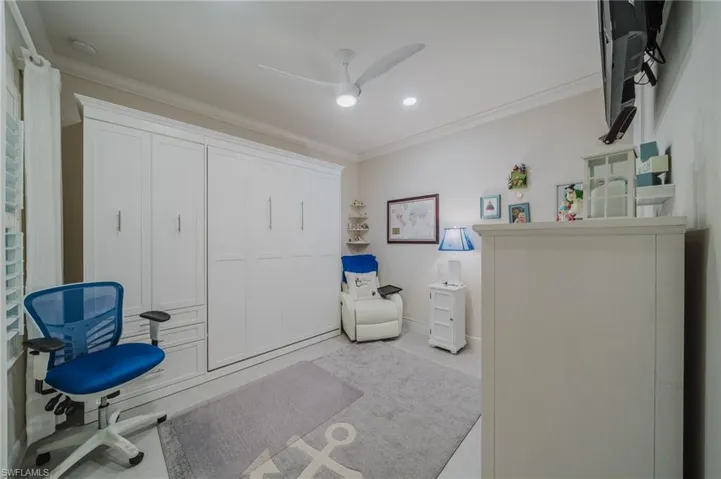 Office area featuring ornamental molding, a ceiling fan, recessed lighting, and tile patterned flooring