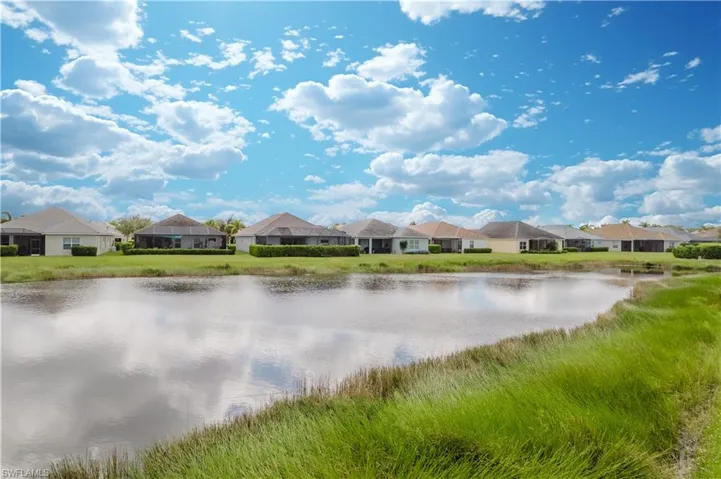 Water view featuring nearby suburban area