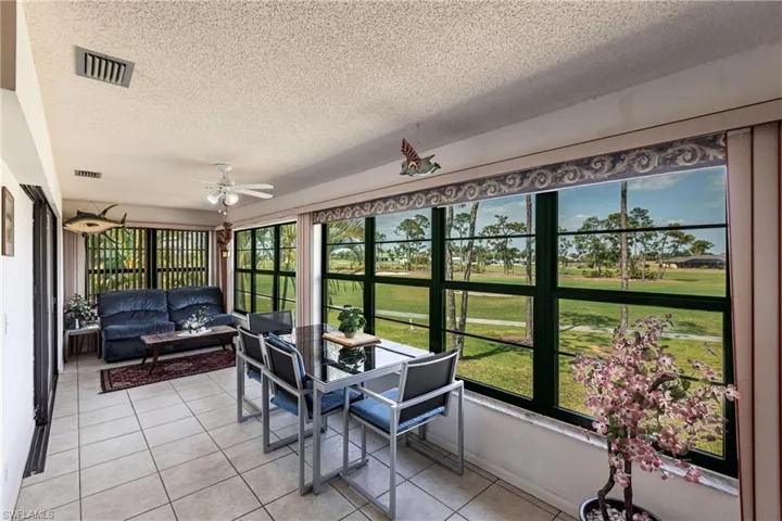 Golf Course View from enclosed lanai & rear door to back yard