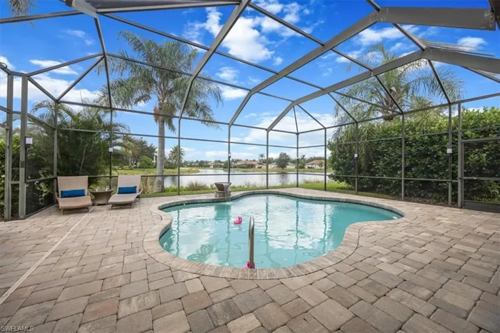 Gorgeous pool overlooking the lake with magnificent east exposure for fabulous sunrises