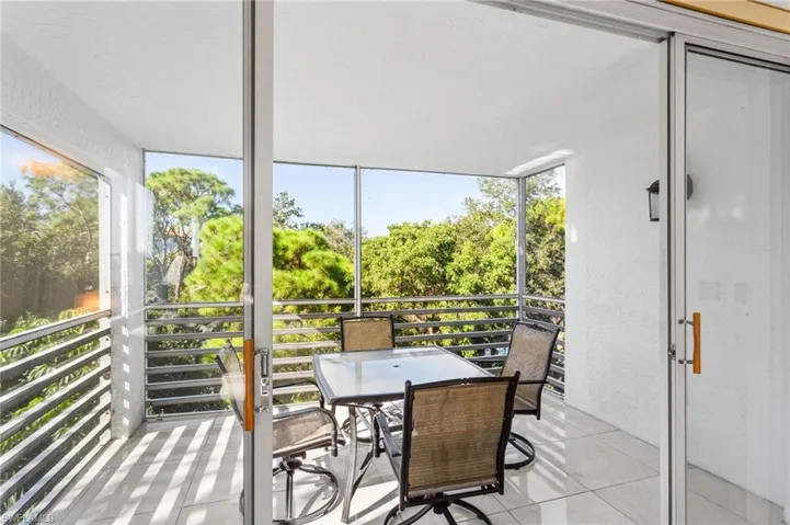 The 5th-floor southwest corner lanai offers stunning views of the preserve and all the sunsets!