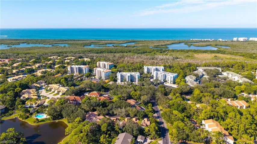 Aerial view building with Gulf behind