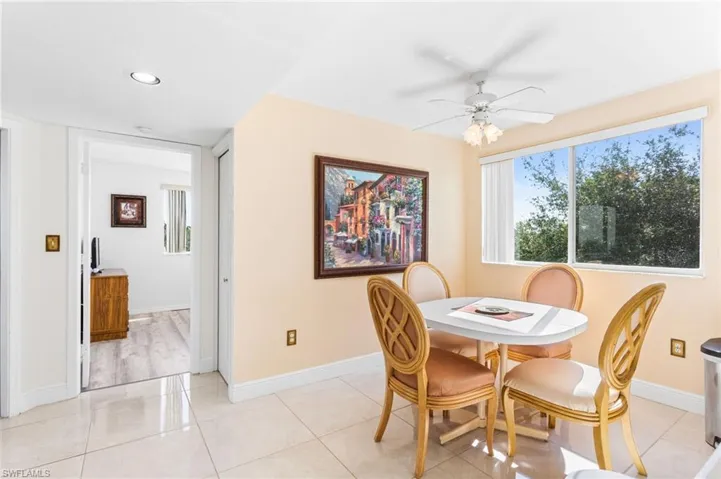 The bright breakfast area provides so many options: casual eating space, office space, or kitchen expansion space!