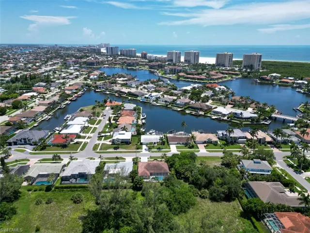 View of urban area featuring a nearby body of water and nearby suburban area